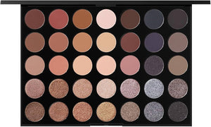 Morphe Magic Mirror Makeup Palette with colorful eyeshadows and mirror, featuring a variety of vibrant and neutral shades.