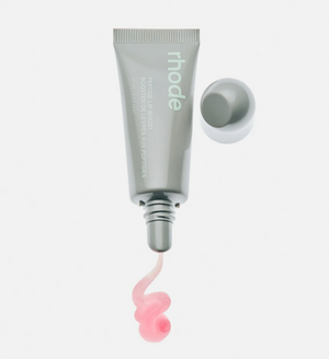 Rhode Skin Peptide Lip Boost in Sugar Mint, a makeup product shown in a sleek tube with mint-green packaging and a clear applicator.