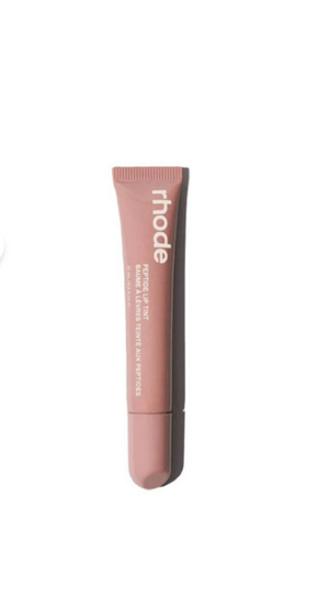 R. Beauty Peptide Lip Tint in Toast, makeup product with tinted lips and natural finish, shown in a close-up image.