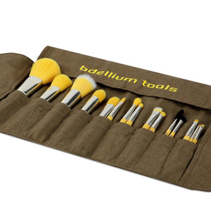 Yellow Bambu Complete 15-piece makeup brush set by Bdellium Tools, featuring various brushes for face and eye makeup application.
