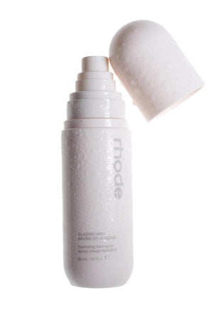 Laylam.ae Glaze Mist makeup spray with a sleek bottle, designed to add a luminous glow to the skin.