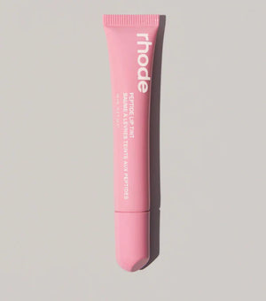 Rhode Skin Peptide Lip Tint in Ribbon, a makeup product with a smooth, tinted lip color displayed in a sleek tube.