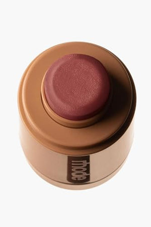 R. Beauty Toast Teddy blush compact with warm peachy-pink shade, featuring a sleek makeup packaging.