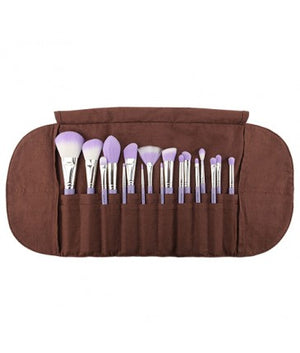 Purple Bambu Precision 17-piece makeup brush set with roll from Bdellium Tools, featuring various brushes for detailed makeup application.
