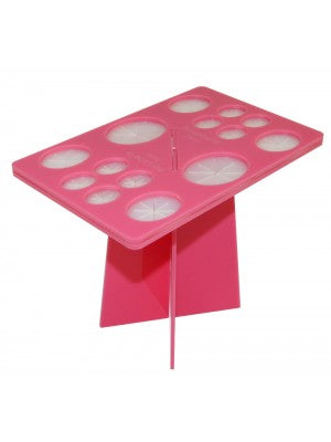Pink Daisy Brush Tree by Benjabelle, a makeup brush organizer with multiple slots for keeping brushes tidy and accessible.
