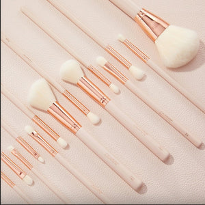Colourpop Ultimate Makeup Brush Roll with multiple compartments for organizing and storing makeup brushes and tools.