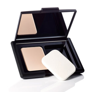 ELF translucent matifying powder in a compact, showing a smooth, matte finish for a natural makeup look.