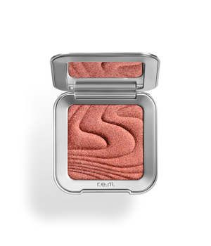 r.e.m beauty Jupiter highlighter makeup with shimmering, light-reflecting finish in a sleek compact.