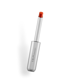 r.e.m beauty Twisted Lipstick in a sleek tube, showing a vibrant, twisted makeup lipstick ready for application.