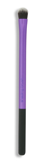Real Techniques shading brush for makeup application, featuring soft bristles and a sleek handle for blending and contouring.